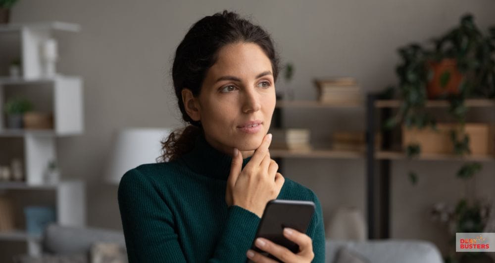 ChatGPT said:
Woman holding phone, thoughtfully considering eligibility for the bankruptcy means test
